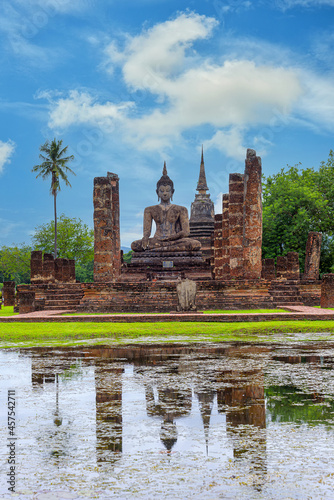 Ancient Buddha Statue at Sukhothai historical park, UNESCO World Heritage Site in Thailand © nuwatphoto