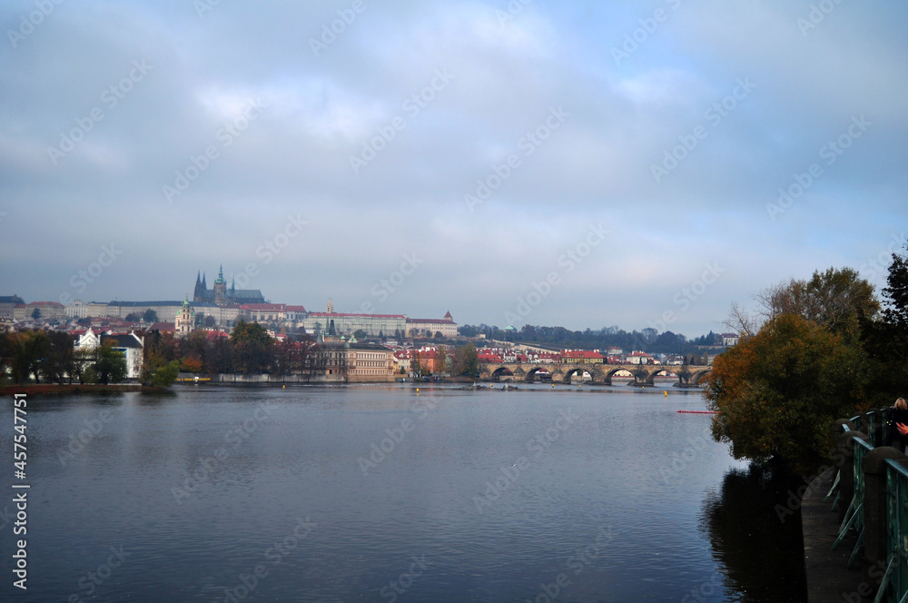 Landscape cityscape classic antique building and Prague castle with Charles Bridge crossing Vltava river for Czechia people and foreign travelers travel visit at Praha city in Prague, Czech Republic