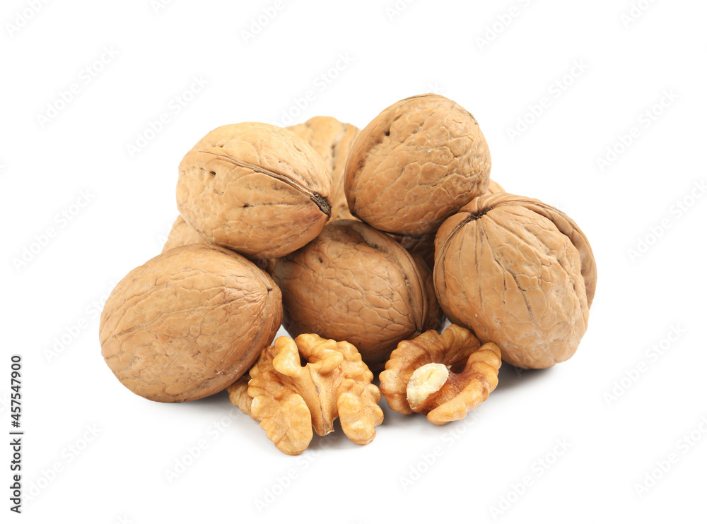 Pile of ripe walnuts on white background Pile of ripe walnuts on white background