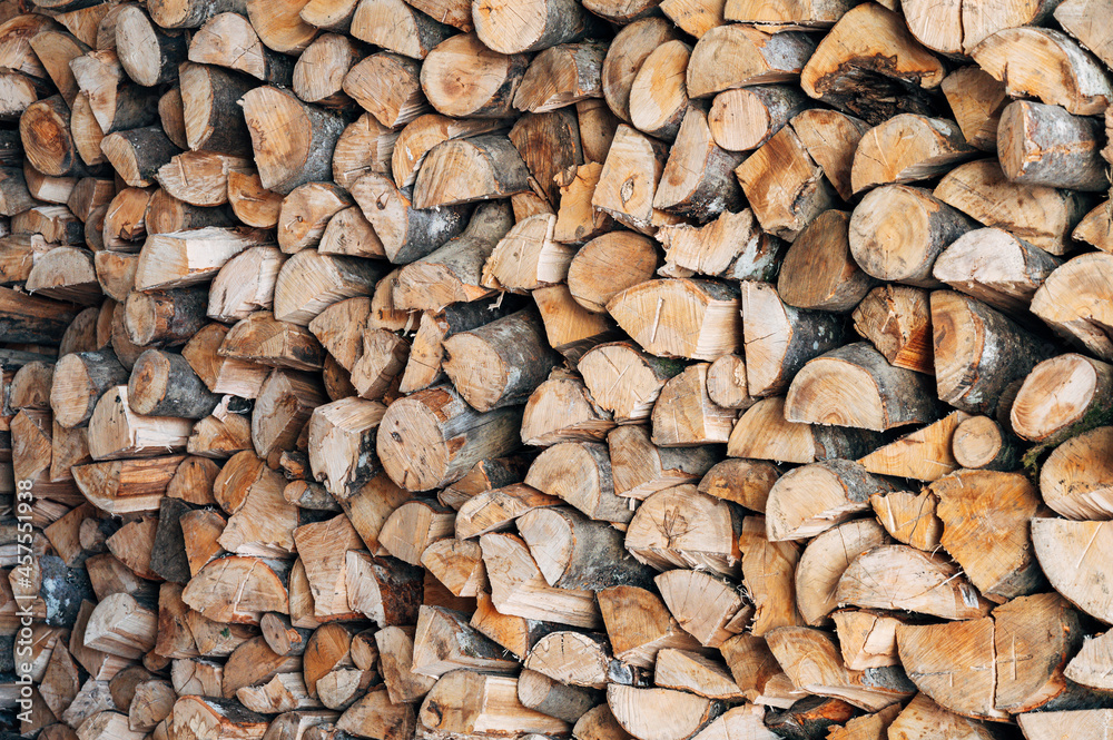 Pile of wood logs ready for winter. Background Pile of wood logs ready for winter. Background