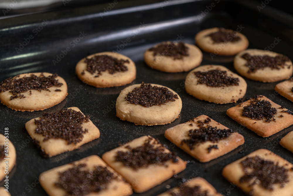Close-up of homemade cookies with black sugar on top