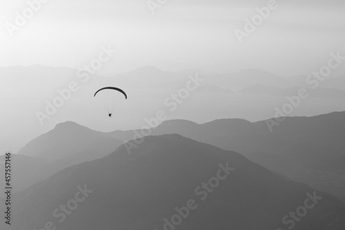 Paraglider over the mountains