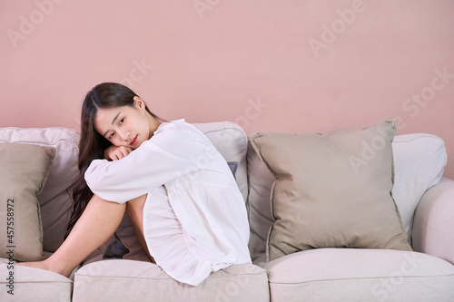 lonely or sad woman sit on sofa
