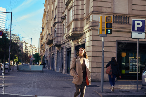 Photography A reflective lady waiting to cross the street