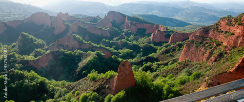 Beautiful landscape with red mountains and green fields. Las Medulas, Leon, Castilia, Spain. Europe