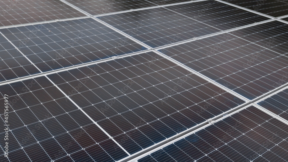 Photovoltaic solar panel extreme close up. Close-up of modern photovoltaic solar battery panels. Solar panel, photovoltaic, alternative electricity source. Efficient ecological solar farm. Photovoltaic solar panel extreme close up. Close-up of modern photovoltaic solar battery panels. Solar panel, photovoltaic, alternative electricity source. Efficient ecological solar farm.