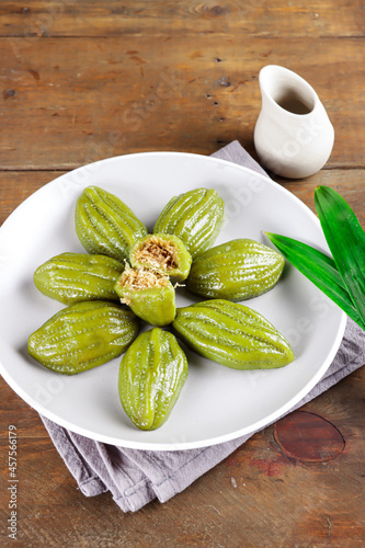 Kue Pepare or papari, traditional cake from Banjarmasin Indonesia, made of glutinous flour and filled with coconut and brown sugar. photo