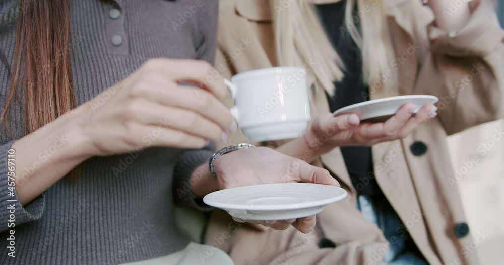 close up tea and coffee cups, Best friends are drinking tea and coffee in street close up tea and coffee cups, Best friends are drinking tea and coffee in street