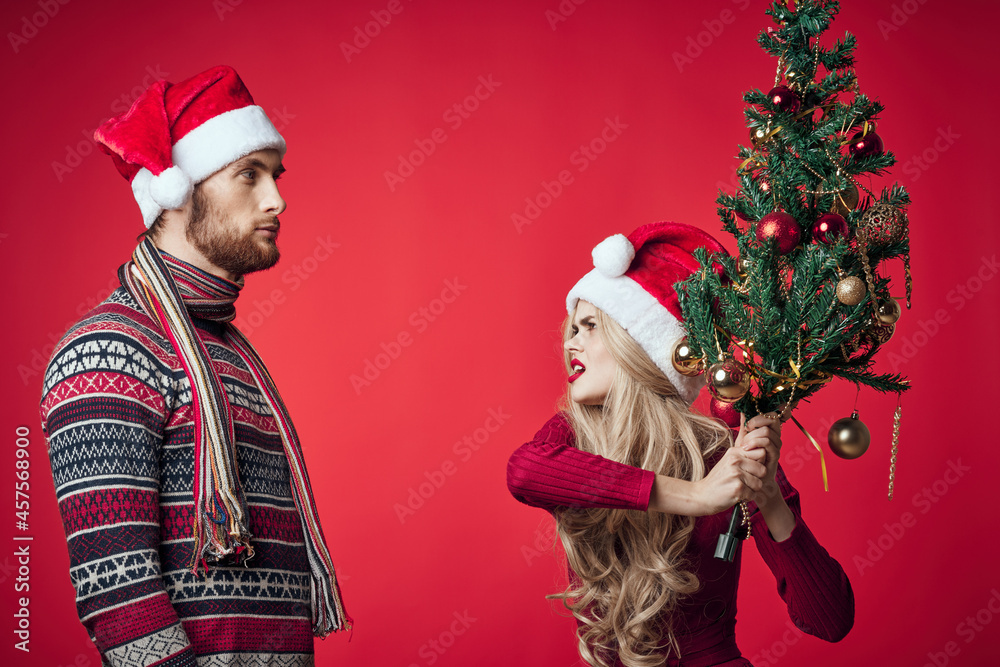 young couple in new year clothes together holiday emotions merry christmas young couple in new year clothes together holiday emotions merry christmas