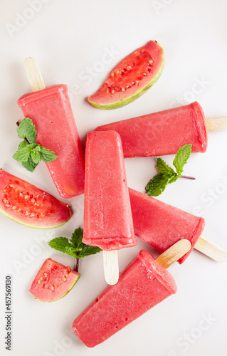 Es lolipop jambu biji. Homemade frozen popsicles made from fresh guava. Healthy summer snack. Guava popsicle ice cream.