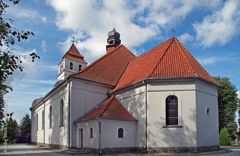 General view and architectural details of the Catholic Church of Our Lady of the Rosary in Iłowo Osada na warmi in Poland.