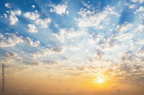 Canvas Print Beautiful blue sky with clouds, sunset and sunbeams