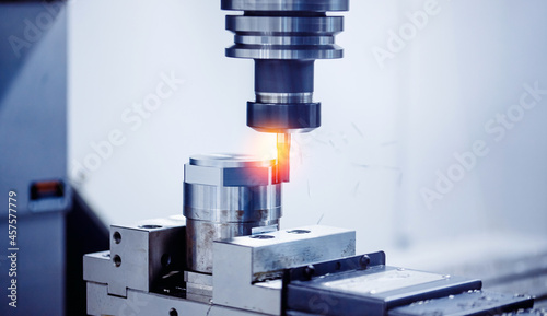 Macro photo banner industry CNC drill robot turning milling factory metal machine with red light photo