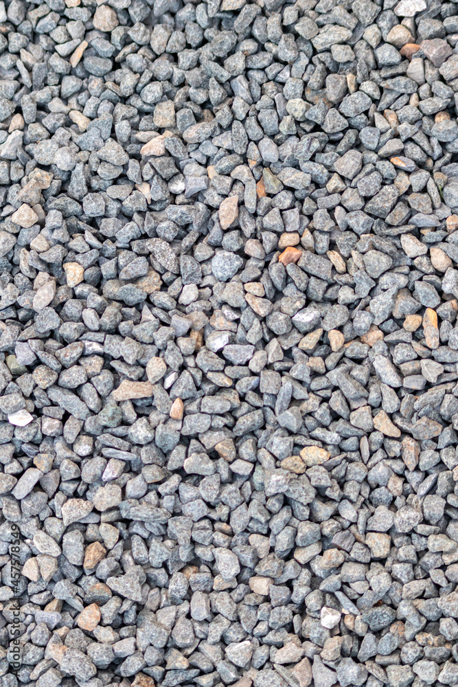 Raw rocks and minerals as natural stones background with crushed and rough material at a rough coast or rocky beach show nuggets and sandstones in harmonic pastel colors as natural mineral background Raw rocks and minerals as natural stones background with crushed and rough material at a rough coast or rocky beach show nuggets and sandstones in harmonic pastel colors as natural mineral background