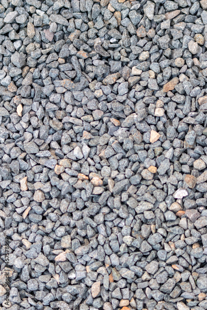 Raw rocks and minerals as natural stones background with crushed and rough material at a rough coast or rocky beach show nuggets and sandstones in harmonic pastel colors as natural mineral background Raw rocks and minerals as natural stones background with crushed and rough material at a rough coast or rocky beach show nuggets and sandstones in harmonic pastel colors as natural mineral background