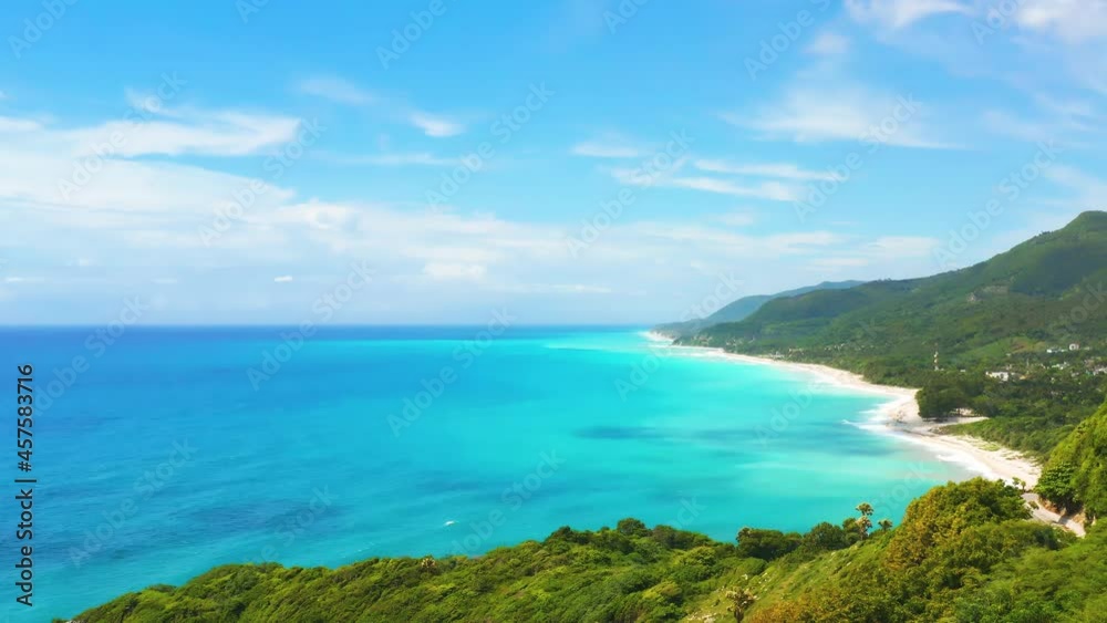 Dawn in the Barahona mountains of the Dominican Republic. Caribbean sea and mountains landscape. Tropical paradise at sunrise. Dawn in the Barahona mountains of the Dominican Republic. Caribbean sea and mountains landscape. Tropical paradise at sunrise.