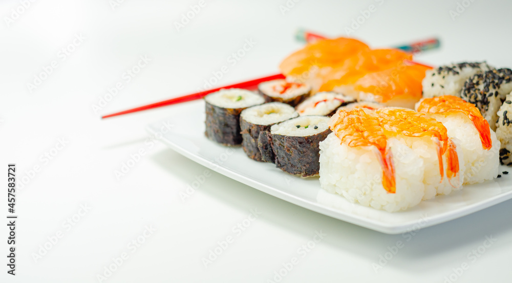 Set of smoked salmon nigiri, Ebi king prawn nigiri, sweet chilli pawn and red pepper California roll, cucumber with wasabi hosomaki roll and red pepper hosomaki roll Set of smoked salmon nigiri, Ebi king prawn nigiri, sweet chilli pawn and red pepper California roll, cucumber with wasabi hosomaki roll and red pepper hosomaki roll