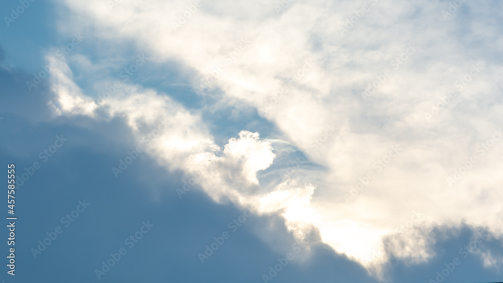 blue sky with clouds natural background. Dramatic natural scene with cloud, sky and light