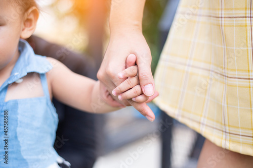 Mother's and a child hands