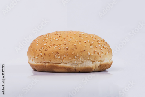 Cheeseburger bun on white isolated background. Two Hamburger buns with sesame isolated on white background