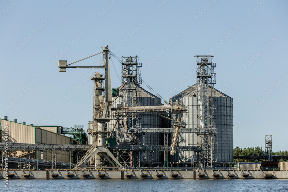 grain storage silos on the river bank