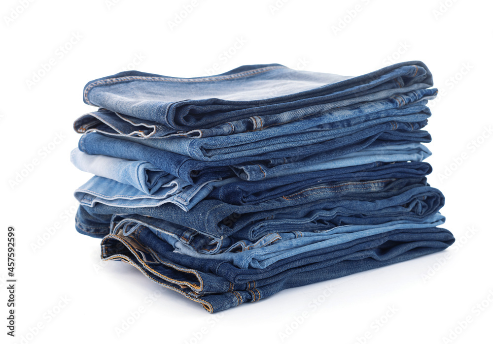Denim jeans isolated at white background. Stack of jean Denim jeans isolated at white background. Stack of jean