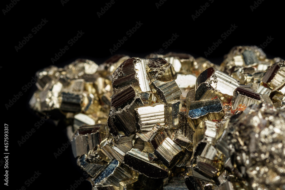 Macro mineral stone Pyrite on a black background Macro mineral stone Pyrite on a black background