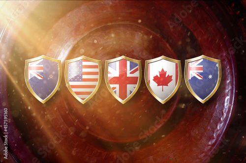 Australia, us, great britain,canada, and new zealand flags in golden shield on copper texture background.5 eyes alliance. photo