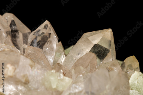 Macro mineral stone Prehnite quartz on a black background
