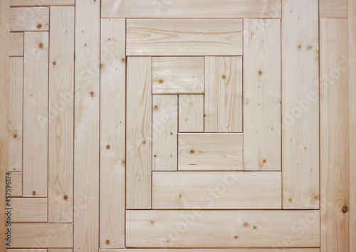 panel of wooden blocks stacked in a square pattern for design of walls and floors close-up background © Irina