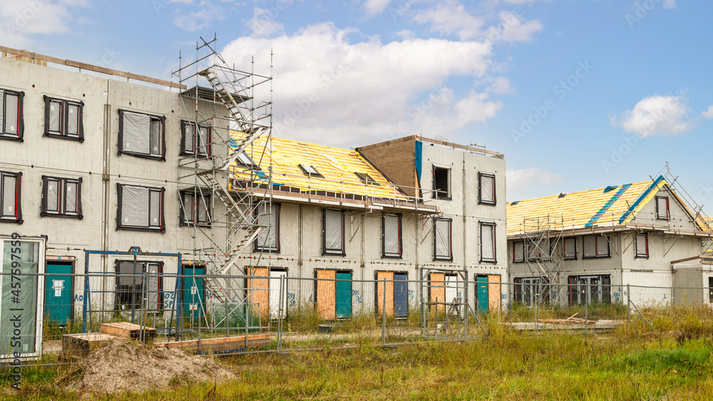 Construction of new homes in a new residential area. Construction of new homes in a new residential area.