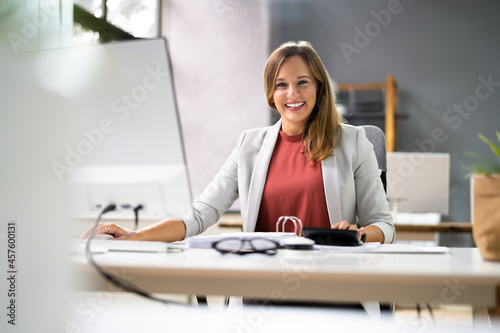 Obraz na płótnie Accountant Women At Desk Using Calculator
