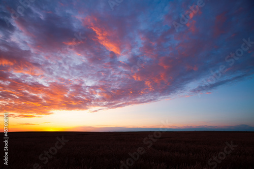 Picturesque colorful sunset with cloudy sky. Photo of textured sky.