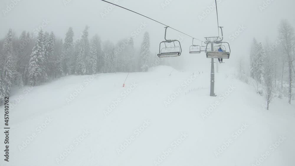 Winter mountain cable car in a snowfall Winter mountain cable car in a snowfall