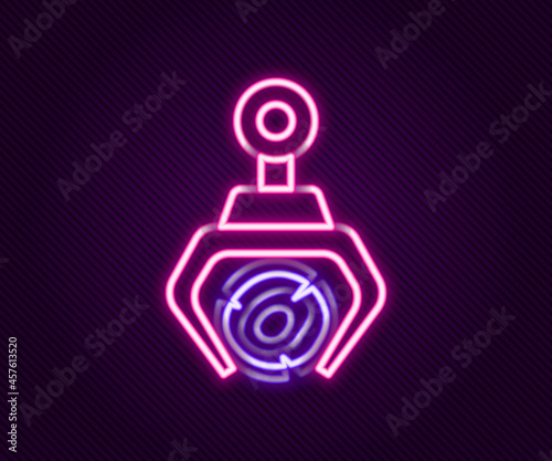 Glowing neon line Grapple crane grabbed a log icon isolated on black background. Forest industry. Industrial crane for lumber trunk wood production. Colorful outline concept. Vector