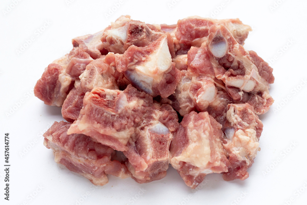 Raw pork ribs on white background.