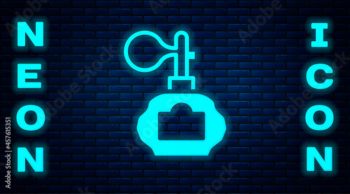 Glowing neon Aftershave bottle with atomizer icon isolated on brick wall background. Cologne spray icon. Male perfume bottle. Vector