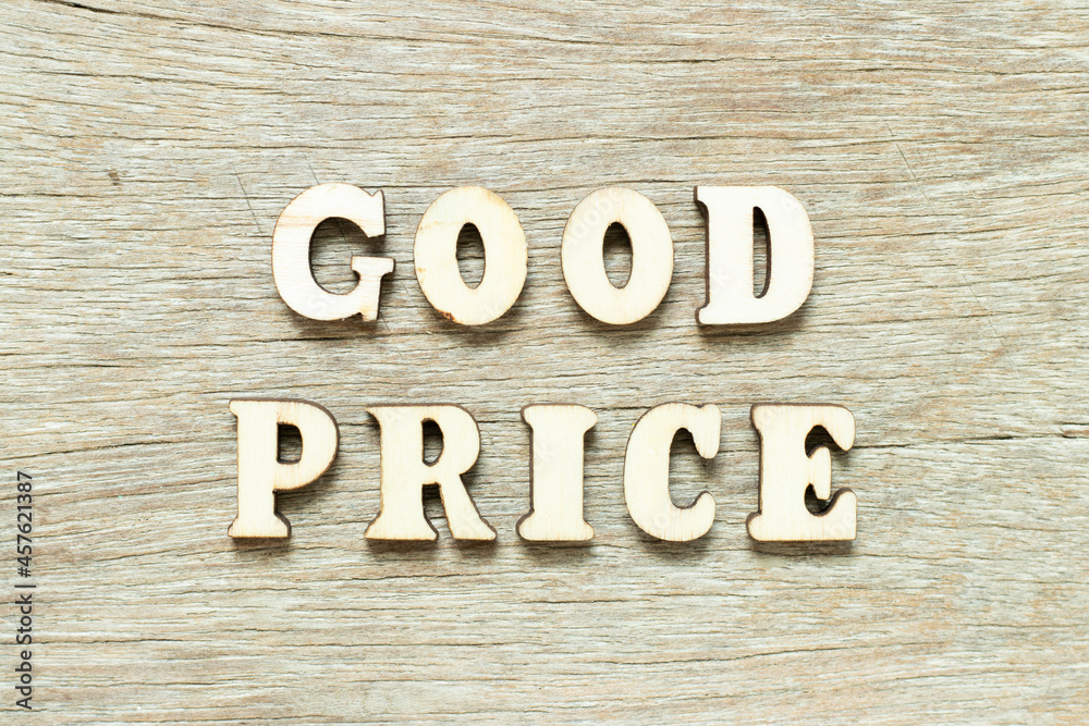 Alphabet letter in word good price on wood background Alphabet letter in word good price on wood background