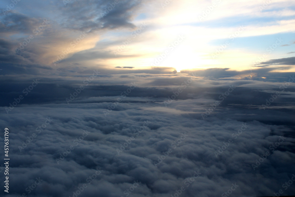 View of the clouds from the airplane window. Dark clouds before the rain. View of the clouds from the airplane window. Dark clouds before the rain.