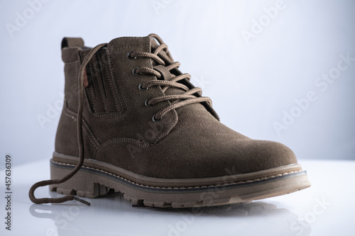 Beautiful fashionable demi-season men's boots made of natural suede.