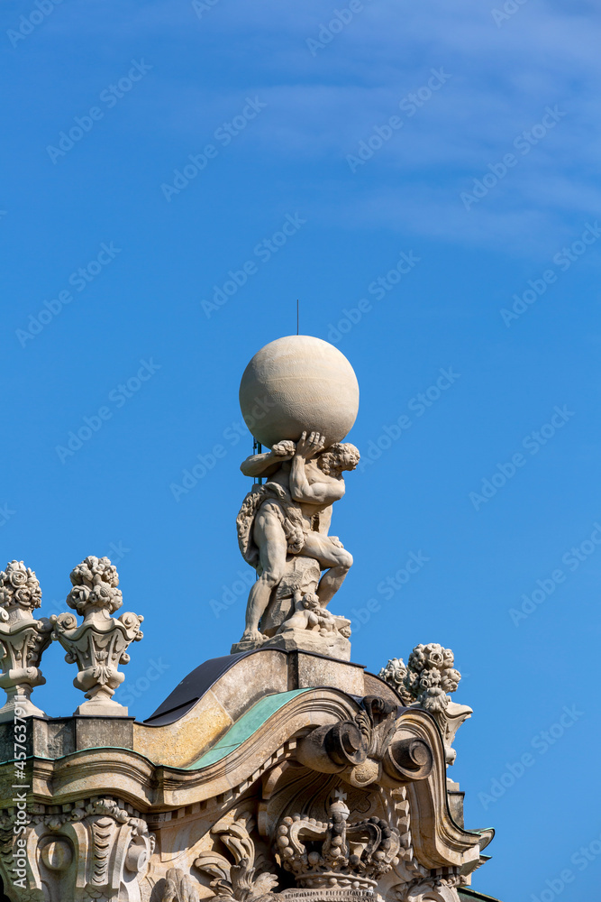 The mythological titan of Atlas on the top of Wall pavillon, 18th century baroque Zwinger Palace, Dresden, Germany