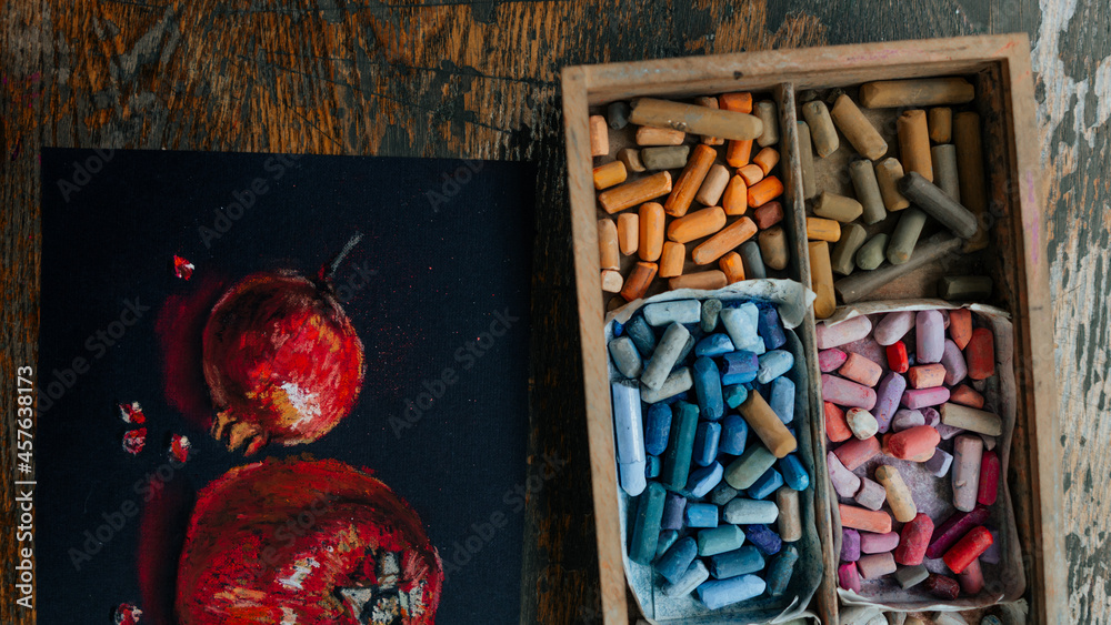 Obraz premium Art studio at home. Colorful pastel chalks. Artist supplies and accessories