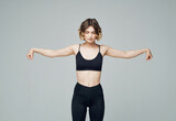 woman in sports uniform yoga balance fitness slim figure