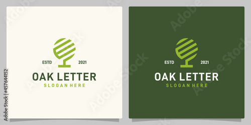 Vintage oak tree abstract design logo vector with letter E or W logo inspiration. Premium vector