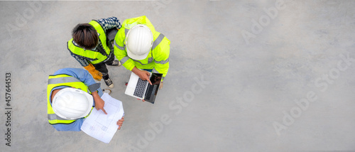 Banner : Civil engineer inspect structure at construction site against blueprint, Building inspector join inspect building structure with civil engineer. Civil engineer hold blueprint inspect building