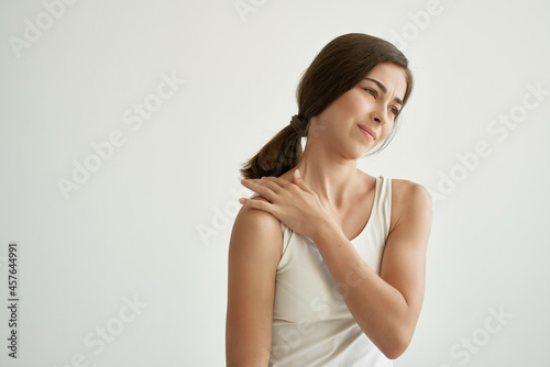 woman holding shoulder health problems massage pain