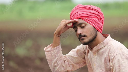 Young indian farmer in depression.