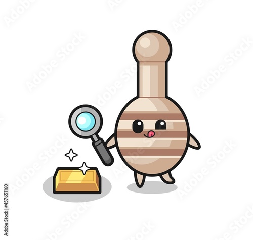 honey dipper character is checking the authenticity of the gold bullion