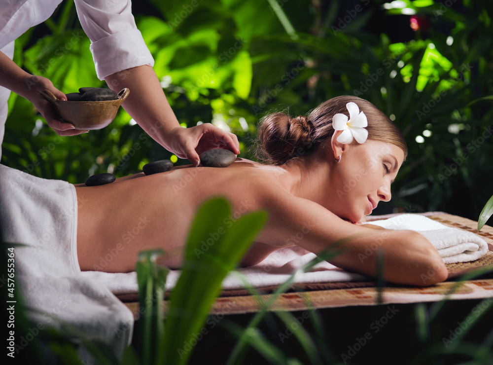 Obraz premium portrait of young beautiful woman in spa environment