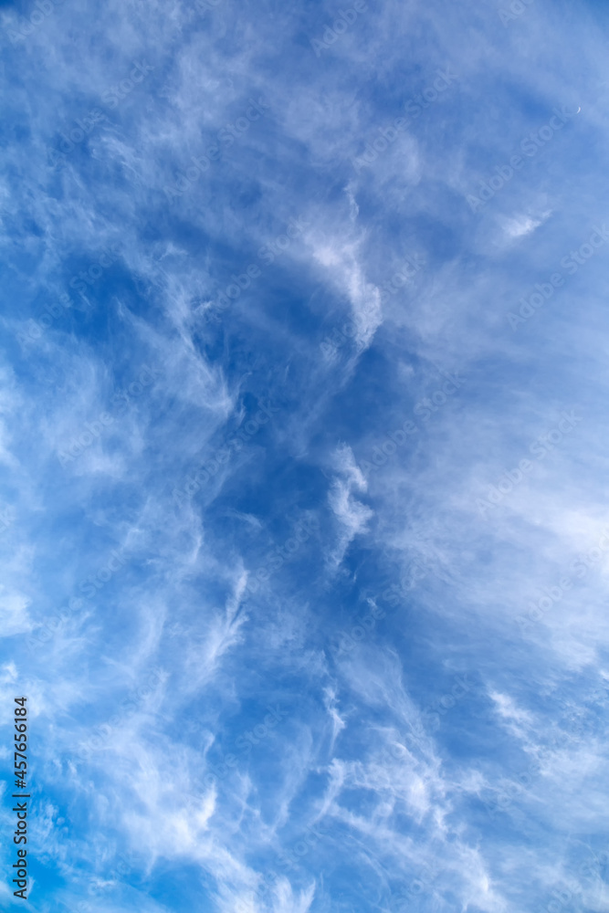 Blue sky abstract background white fluffy clouds